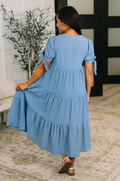 Online Exclusive | One Less Crisis Tiered Midi Dress