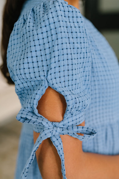 Online Exclusive | One Less Crisis Tiered Midi Dress